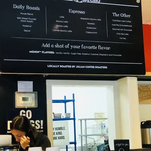 a woman sitting at a counter