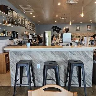 a counter with stools