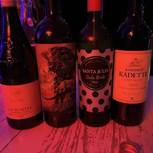 a variety of wines on a table