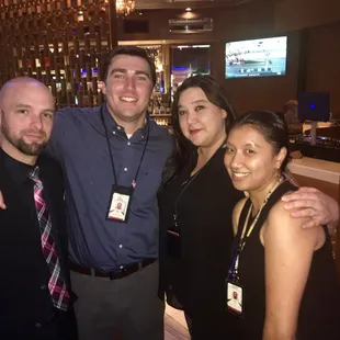 a group of people posing for a picture