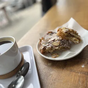 a pastry and a cup of coffee