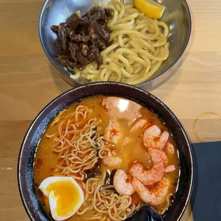 spicy tori paitan ramen with shrimp and Yaki Butter Udon with beef