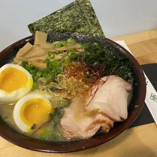 a bowl of ramen with a boiled egg