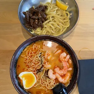 spicy tori paitan ramen with shrimp and Yaki Butter Udon with beef