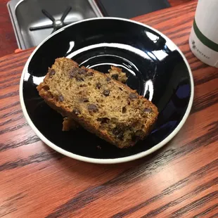 a slice of chocolate chip bread on a plate