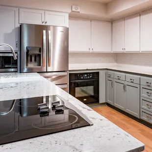 a modern kitchen with stainless steel appliances
