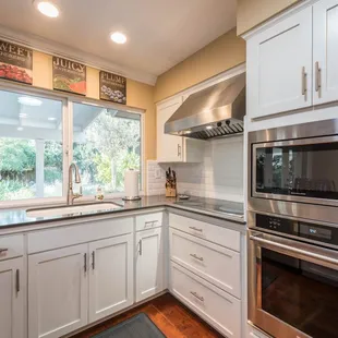 a kitchen with stainless steel appliances