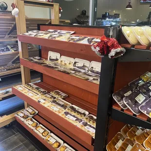 a display of cheeses and pastries