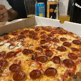 Hot pep pizza from Tommy's pizza inside imbibe