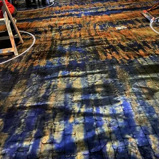 Exhibit, art is even on the floors.