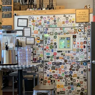 Cooler with lots of brewery stickers