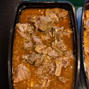 Goat stew - tasty! Bone in, fall off the bone tender.