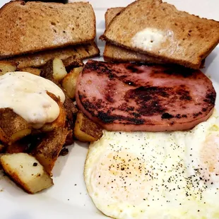 My breakfast plate was so good!! Yes that's gravy on my taters. Yummo!