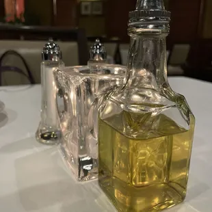 a table setting with salt and pepper shakers