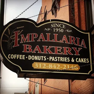 Sign on building for Impallaria Bakery