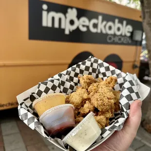 Sauces and curry-spiced popcorn chicken