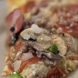 The sampler pizza is like the best ever pizza!! The BEST ever!! And when they say their bruschetta A-Mazing!