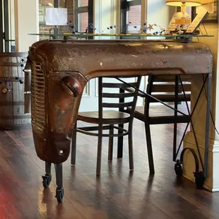 Cute use of an old tractor hood.