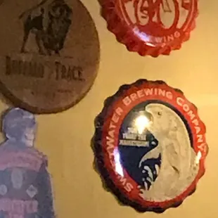Giant bottle caps at the bar