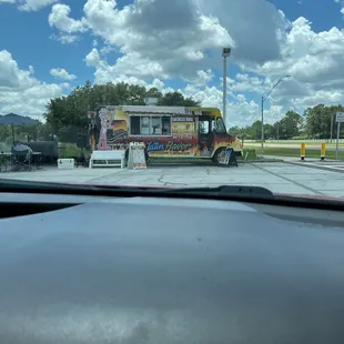 a food truck in a parking lot