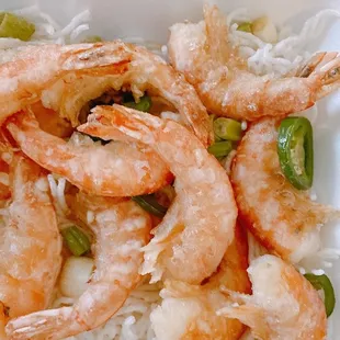 shrimp and rice in a styrofoam container