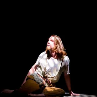 a woman sitting on the floor