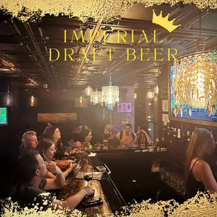 a group of people sitting at a bar