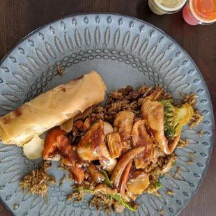 Hunan chicken, veggie fried rice, and a spring roll.