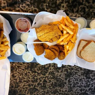 Fried Chicken , Seasoned Fries , Hush Puppies , Catfish, and Lobster  tail.