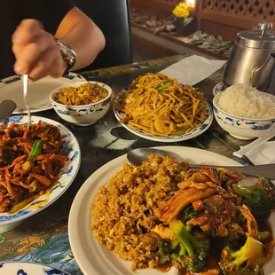 Hot sizzling beef, house style lo mein, chicken and broccoli, fried rice.