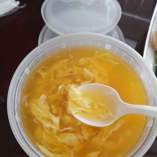 a bowl of soup with a spoon in it