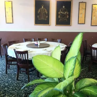 Dining room with 2 large round tables for 10 each