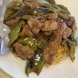 Bitter melon over crispy noodles