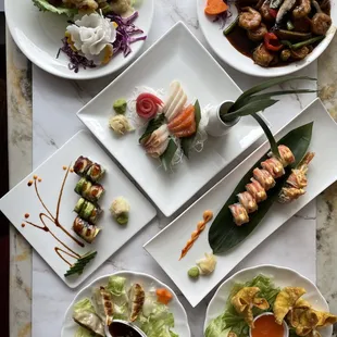 a variety of asian food on plates