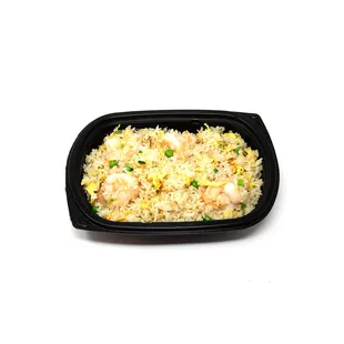 Shrimp Fried Rice

Stir-fried rice with shrimp, eggs, green onions, peas, and white onions.