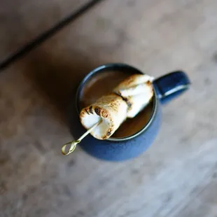 a cup of hot chocolate with marshmallows