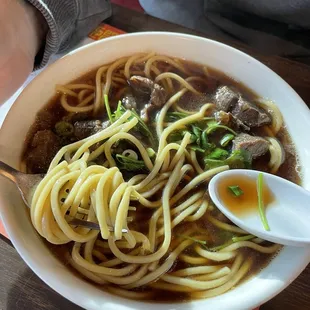 Chinese style beef noodle soup. Broth is delicious and meat is tender!