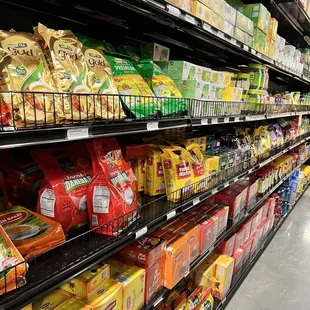 a grocery store aisle filled with food