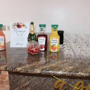 a variety of condiments on a granite countertop