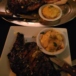 The Delmonico (boneless Ribeye) in the front and the Prime Tomahawk in the back
