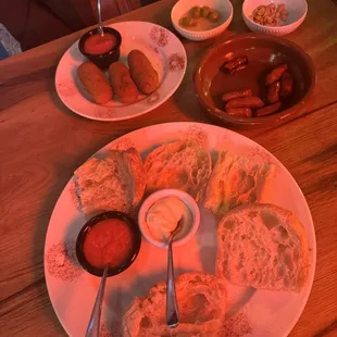 Croquetas de Jamon y béchamel, chistorra flambeada, and pan tumaca à la importante y ajo aceite