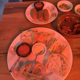 Croquetas de Jamon y béchamel, chistorra flambeada, and pan tumaca à la importante y ajo aceite