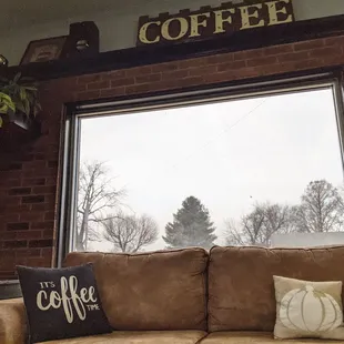 a couch with pillows and pillows