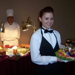 Impressions Gourmet Catering provides professional   uniformed serving personnel for tray passing...