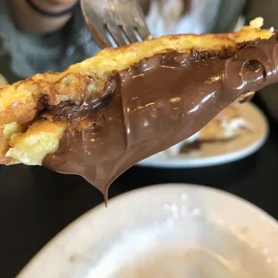 a chocolate dipped pastry