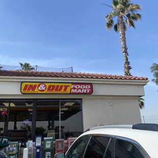 a car parked in front of the store