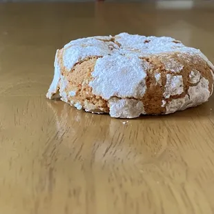 a doughnut on a wooden table