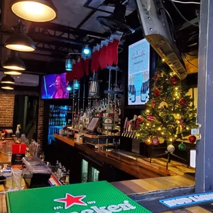 a bar with a christmas tree