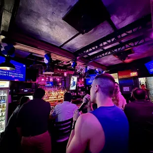 people sitting at a bar