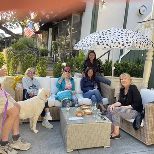 a group of people and a dog